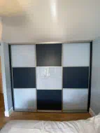 Checker board design in white glass and alby blue panel with champagne frames, fitted in Eaglescliffe (straight)
